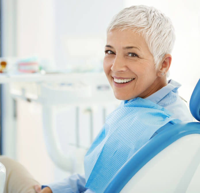 smiling woman at dentist